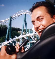 On El Condor at Walibi Flevo, Holland, July 1999 Photo of me with a rollercoaster in the background
