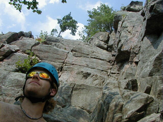 Tristen at the base of a cliff