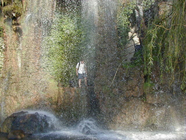 Gerald behind a waterfall
