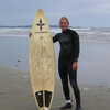 Previous: Alex with surfboard