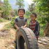 Photo: Boys with tire