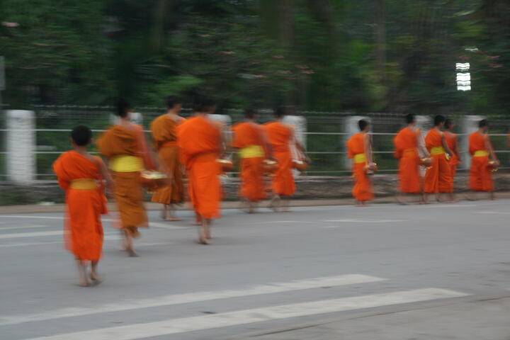 Monks collecting alms