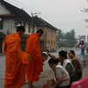 Next: Monks collecting alms