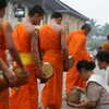 Next: Monks collecting alms
