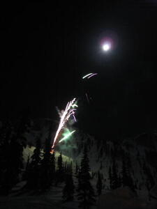 Photo: Fireworks and moon