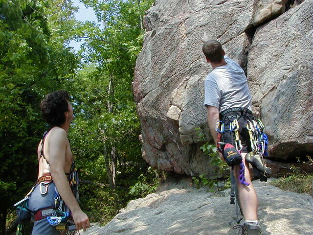 Clive and Andre discuss a climbing route