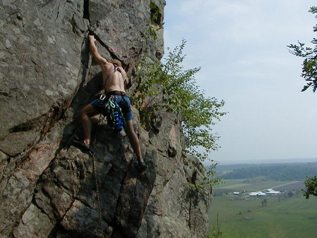 Tristen climbing