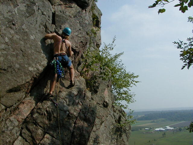 Tristen climbing