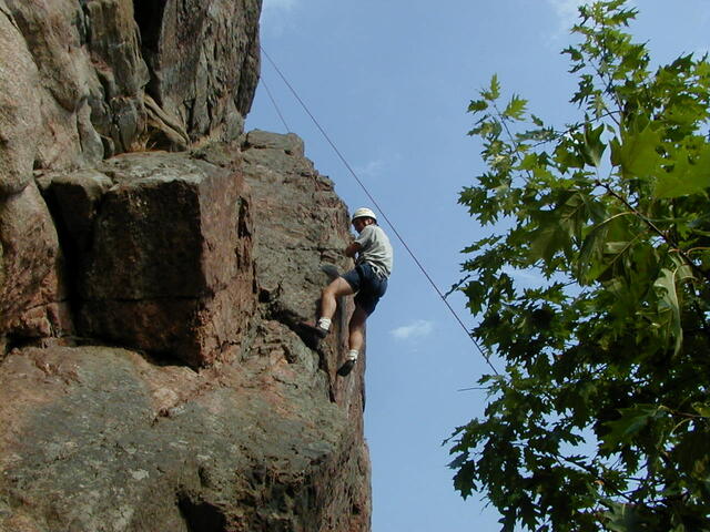 Gerald rappelling down Peggy's Corner