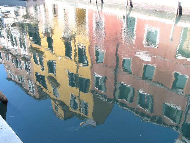 Colorful buildings reflected