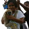 Photo: Kids with monkey, Ko Pan Yi