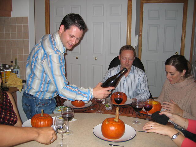 Roger pouring wine