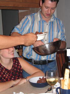 Photo: Roger serving dessert