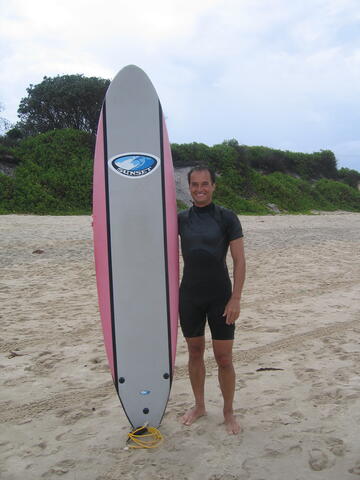 Ger with surfboard