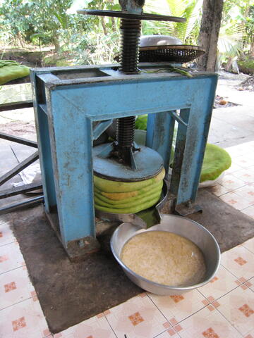 Coconut milk press