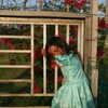Photo: Girl on fence