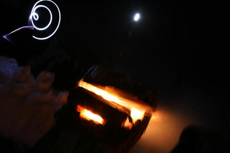 Photo: Headlamp, fire, moon